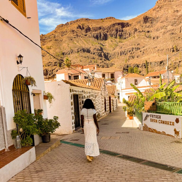 Cheap Holidays to Gran Canaria | lady walking through Fataga village