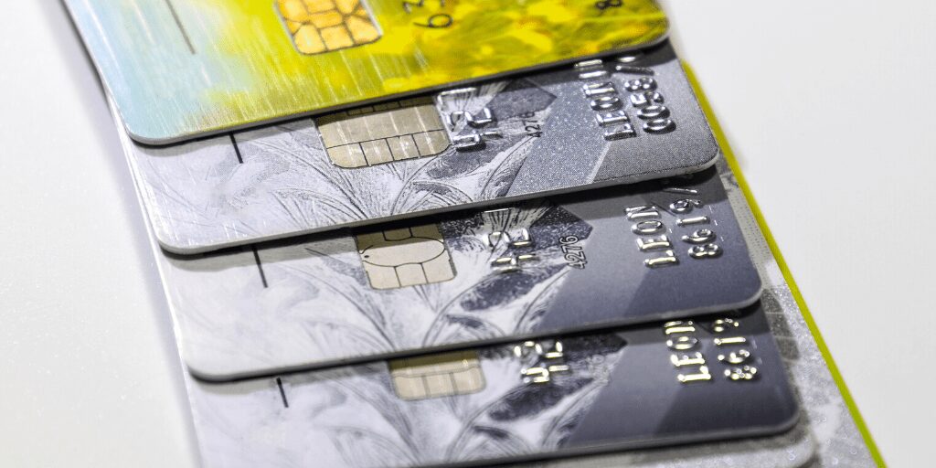 Prepaid Bank Cards in Grey and lime colour | John Lewis Travel Money