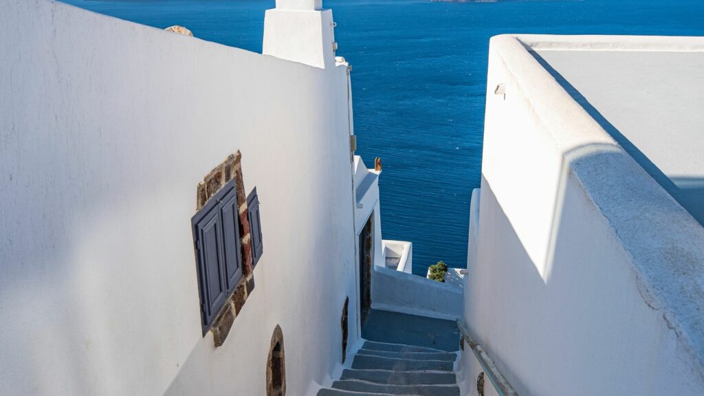 Best Santorini Pools with Infinty Pools 13 Weeks Travel narrow steps and alleys in stunning Santorini views